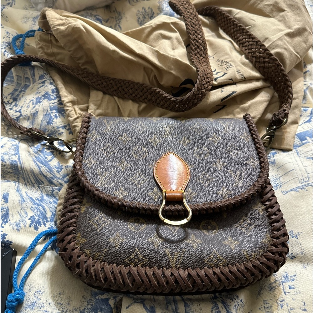 Vintage Boho Louis Vuitton “World Traveler” crossbody.